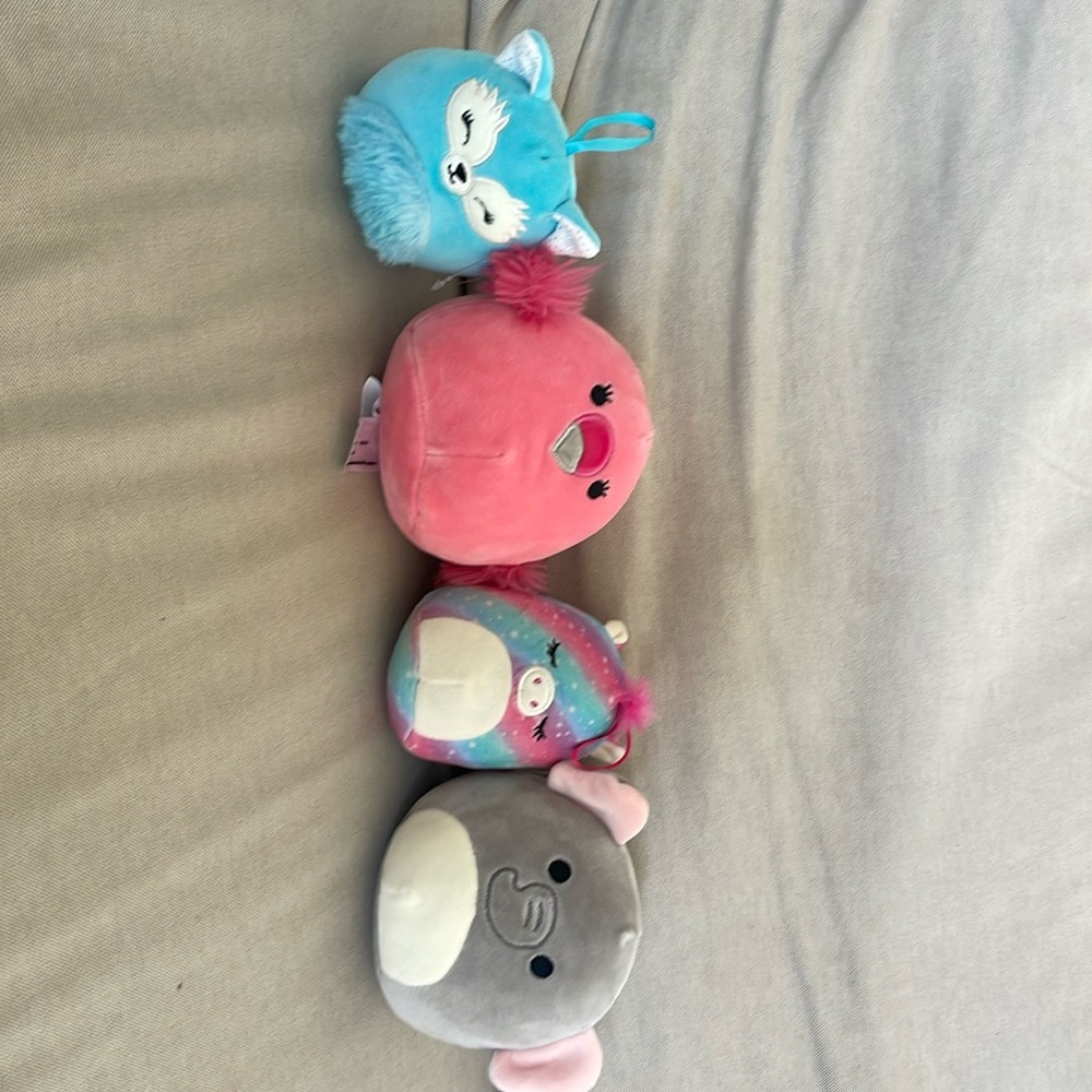 Four mini Squishmalows like new
